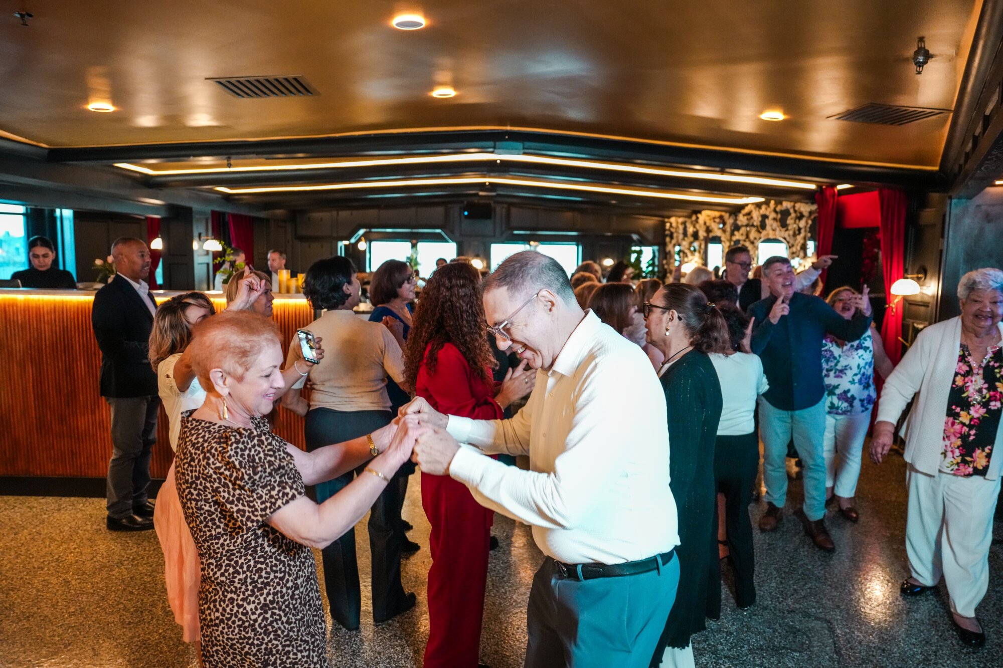 Guests dancing on the floor at Fuego