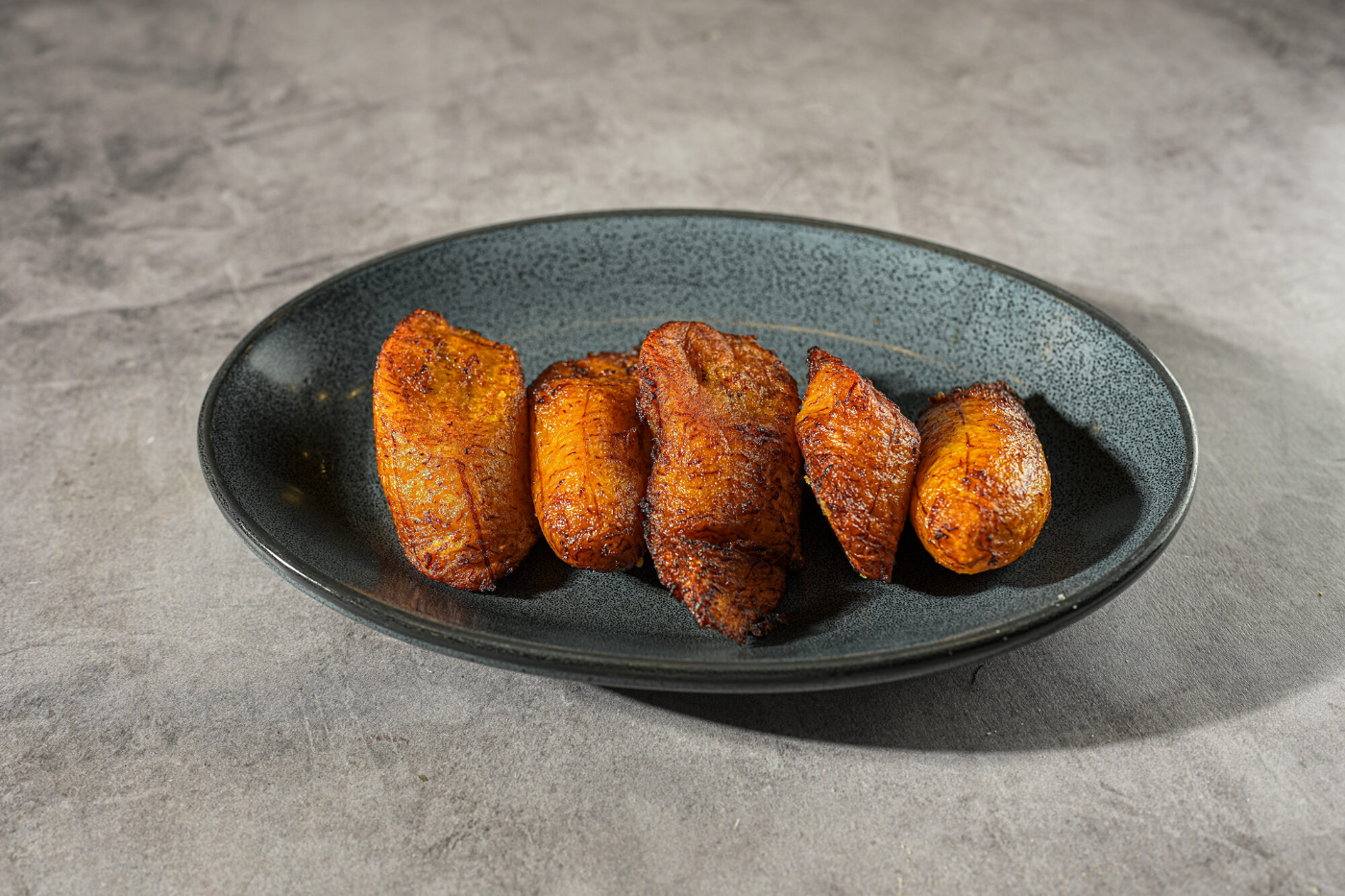 Croquetas served warm in a cast dish